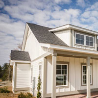 Checking exterior of home during inspection